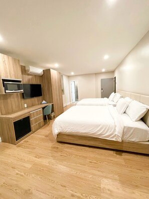 Deluxe Room, 2 Queen Beds | Desk, laptop workspace, iron/ironing board, free WiFi