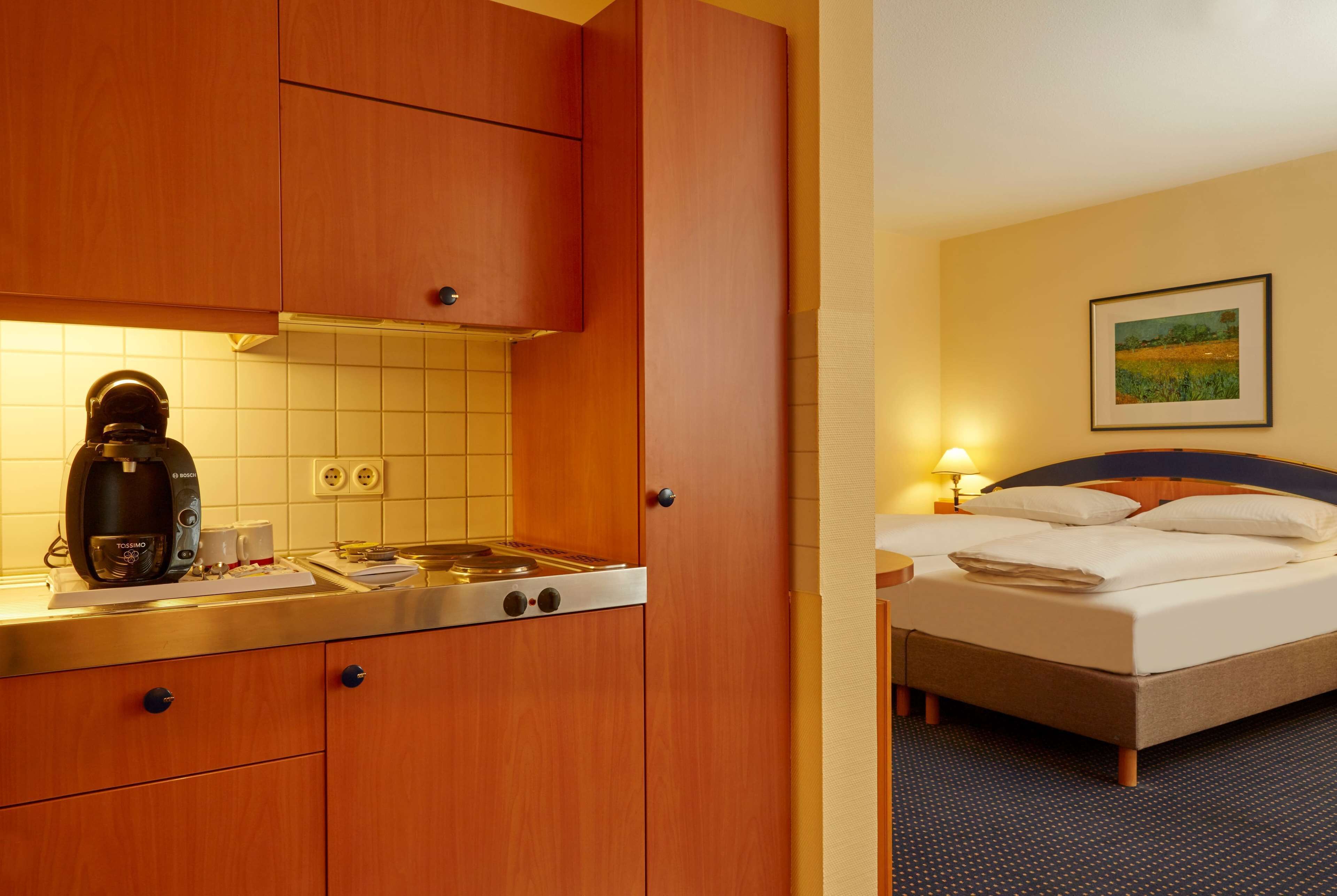 hypo-allergenic bedding, down duvets, in-room safe, desk