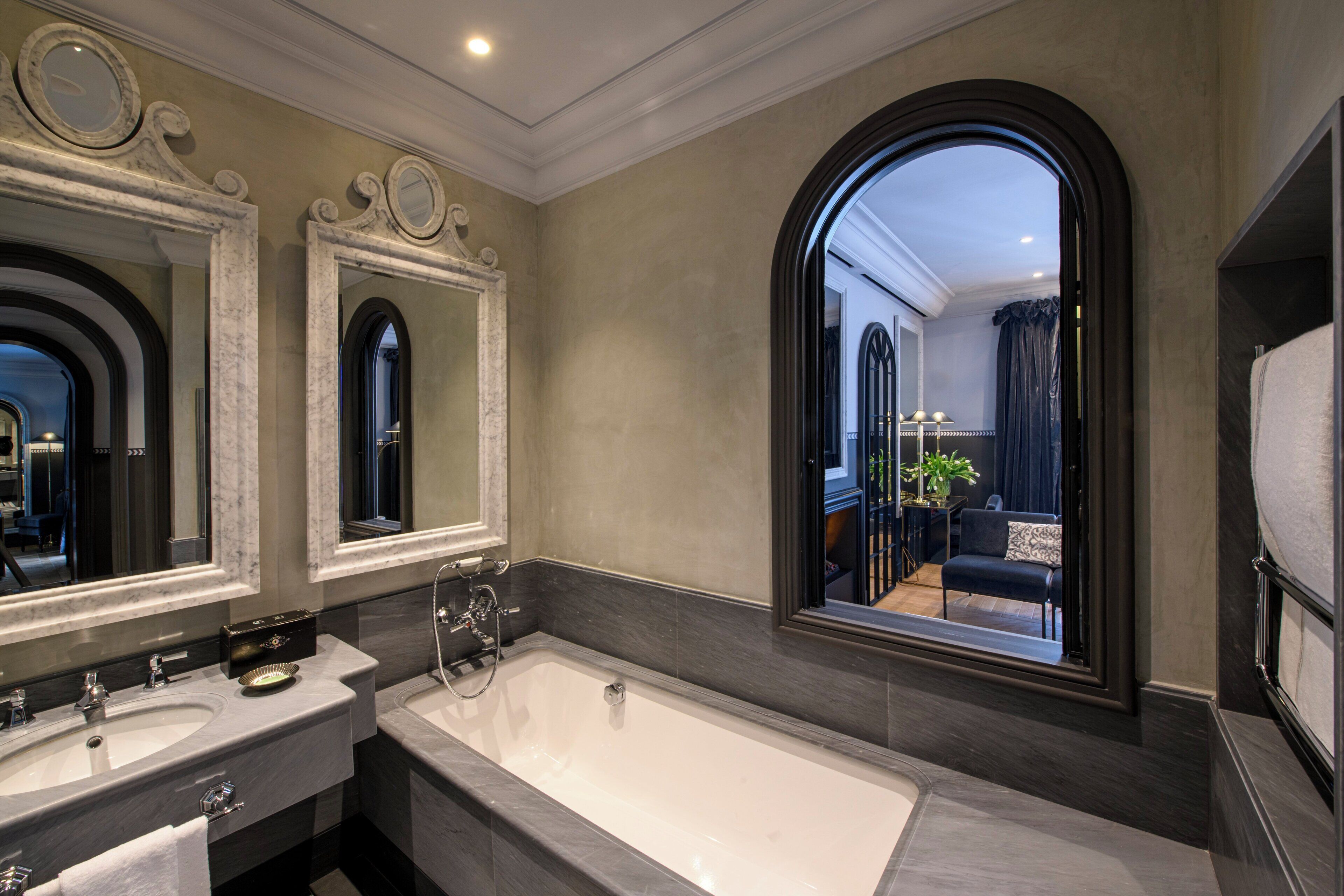 rainfall showerhead, hair dryer, bathrobes, slippers