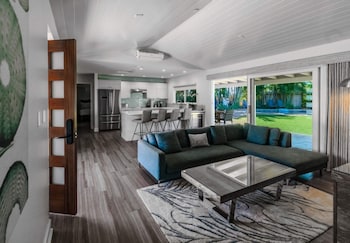 Hotel amenities such as safe, desk and work area at Royal Lahaina Resort & Bungalows