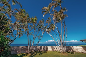 On the beach, white sand, beach cabanas, sun loungers at Royal Lahaina Resort & Bungalows
