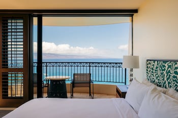 Hotel amenities such as safe, desk and work area at Royal Lahaina Resort & Bungalows