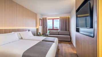 Ropa de cama de alta calidad, minibar, caja fuerte y escritorio
