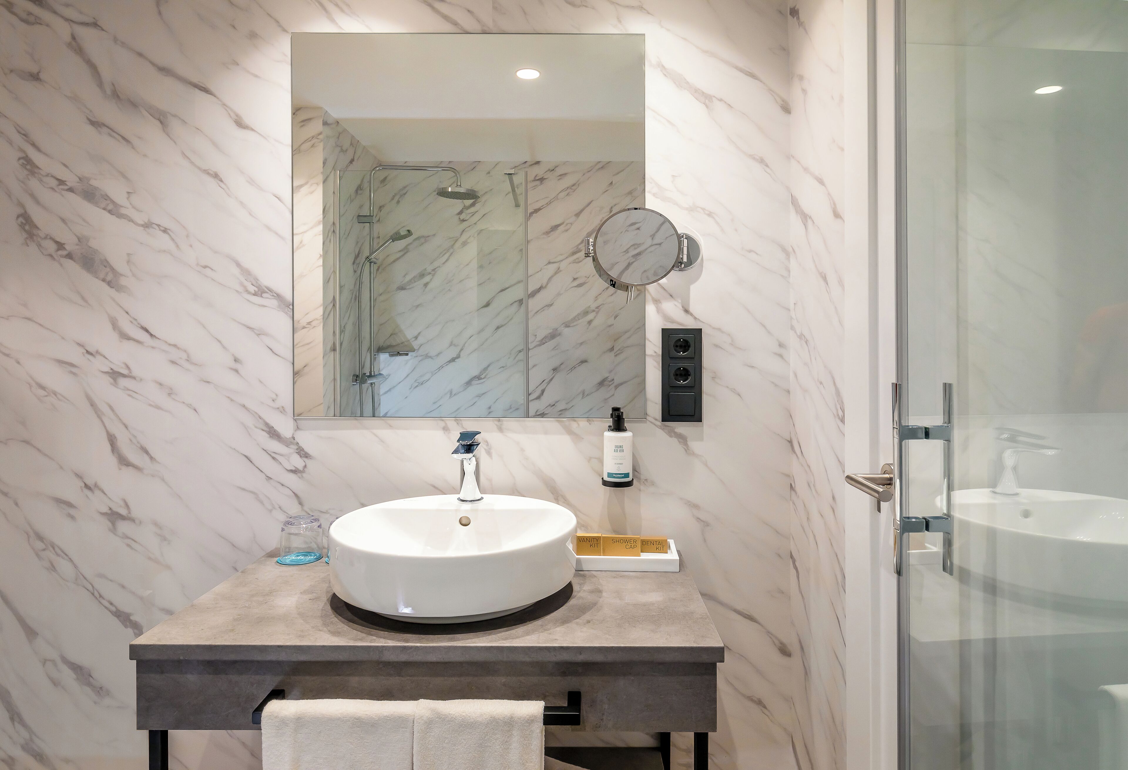 shower, free toiletries, hair dryer, soap