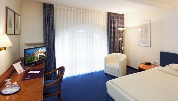 Standaard eenpersoonskamer (1 single bed) | 1 slaapkamer, luxe beddengoed, pillowtop-bedden, een minibar