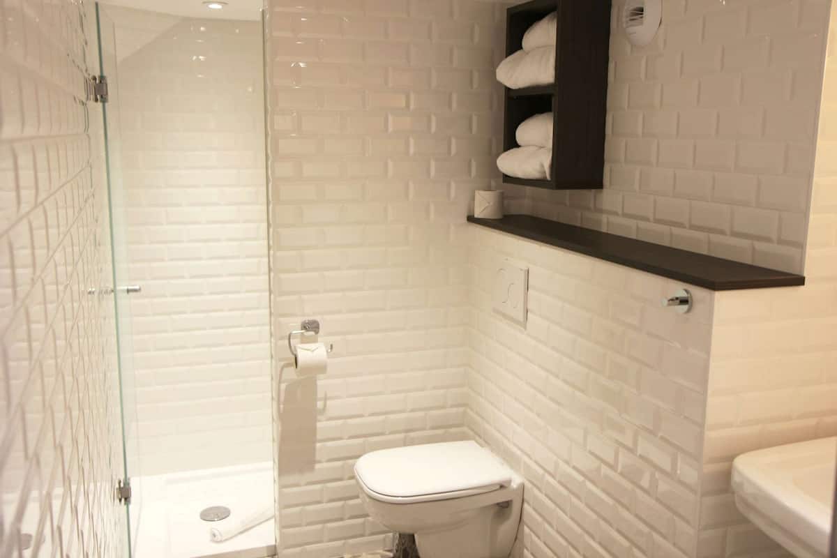 Bathroom | Shower, free toiletries, hair dryer, towels