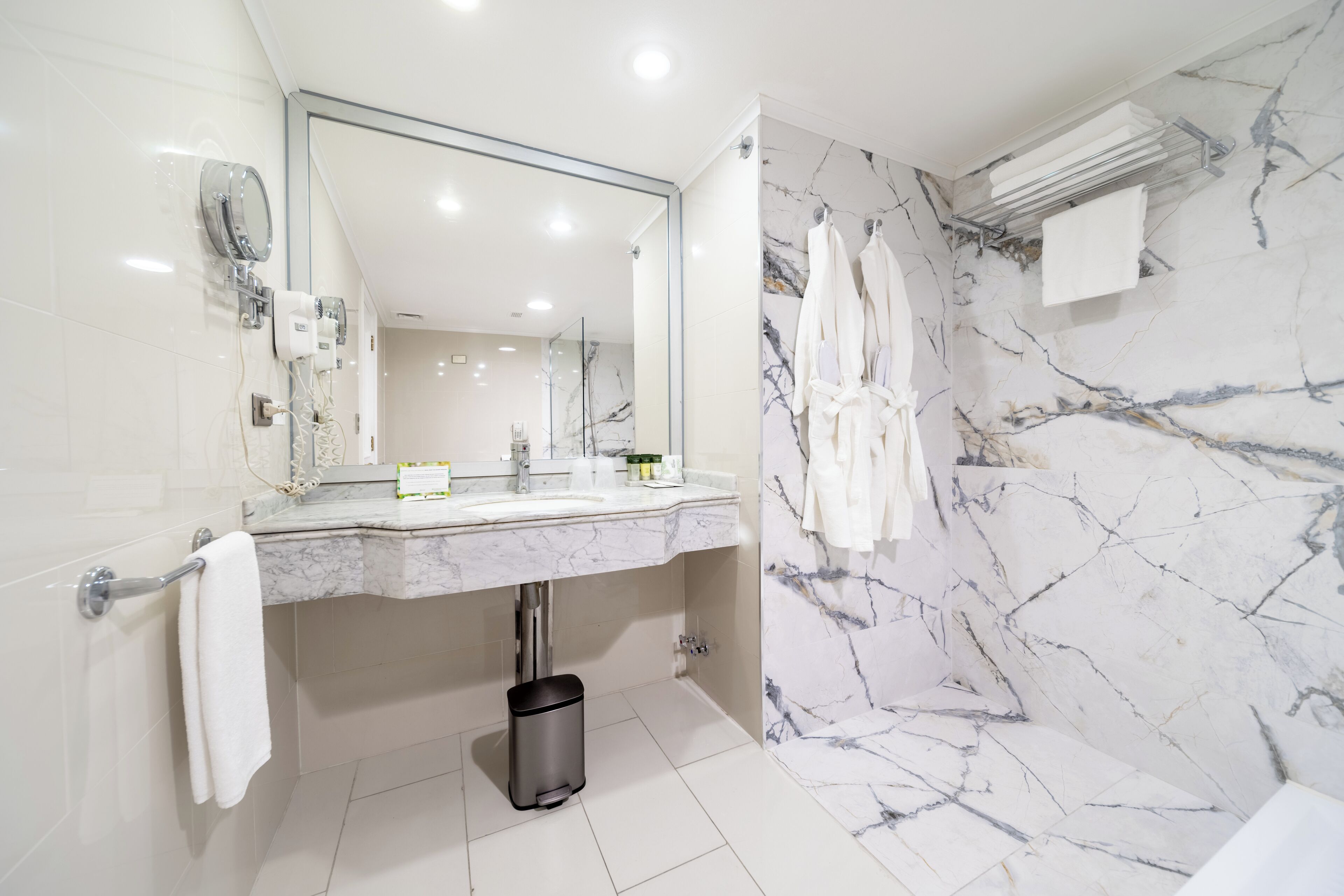 suite, 1 king bed, non smoking | bathroom | shower, rainfall showerhead, free toiletries, hair dryer