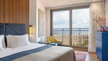 Deluxe Room, Sea View | Minibar, in-room safe, desk, blackout drapes