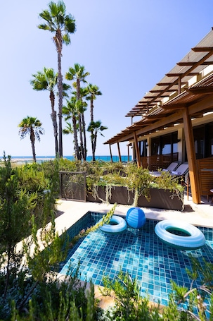 Garden Room with Outdoor tub. Dan Accadia Hotel