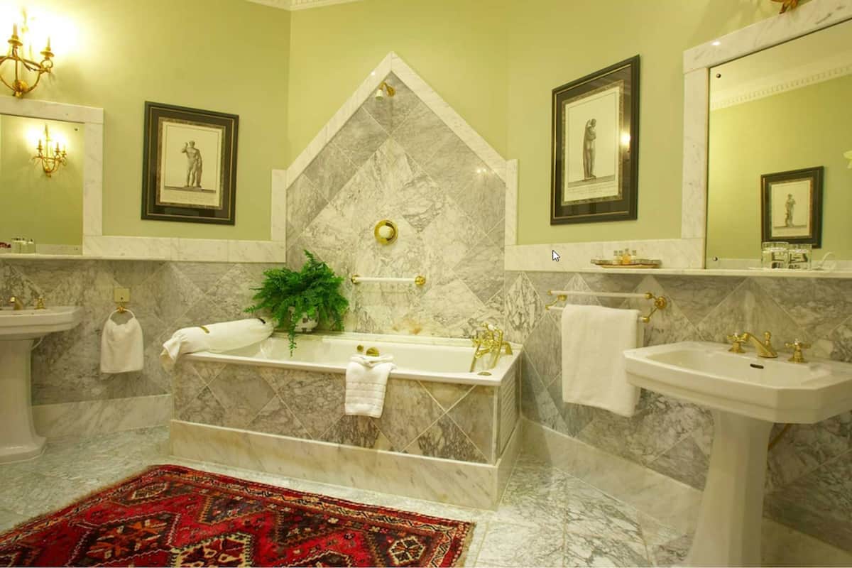 suite | bathroom | designer toiletries, hair dryer, bathrobes, slippers