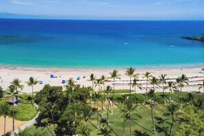 On the beach, sun loungers, beach umbrellas, beach towels