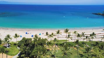 On the beach, sun loungers, beach umbrellas, beach towels