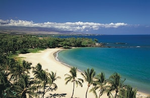 On the beach, sun loungers, beach umbrellas, beach towels