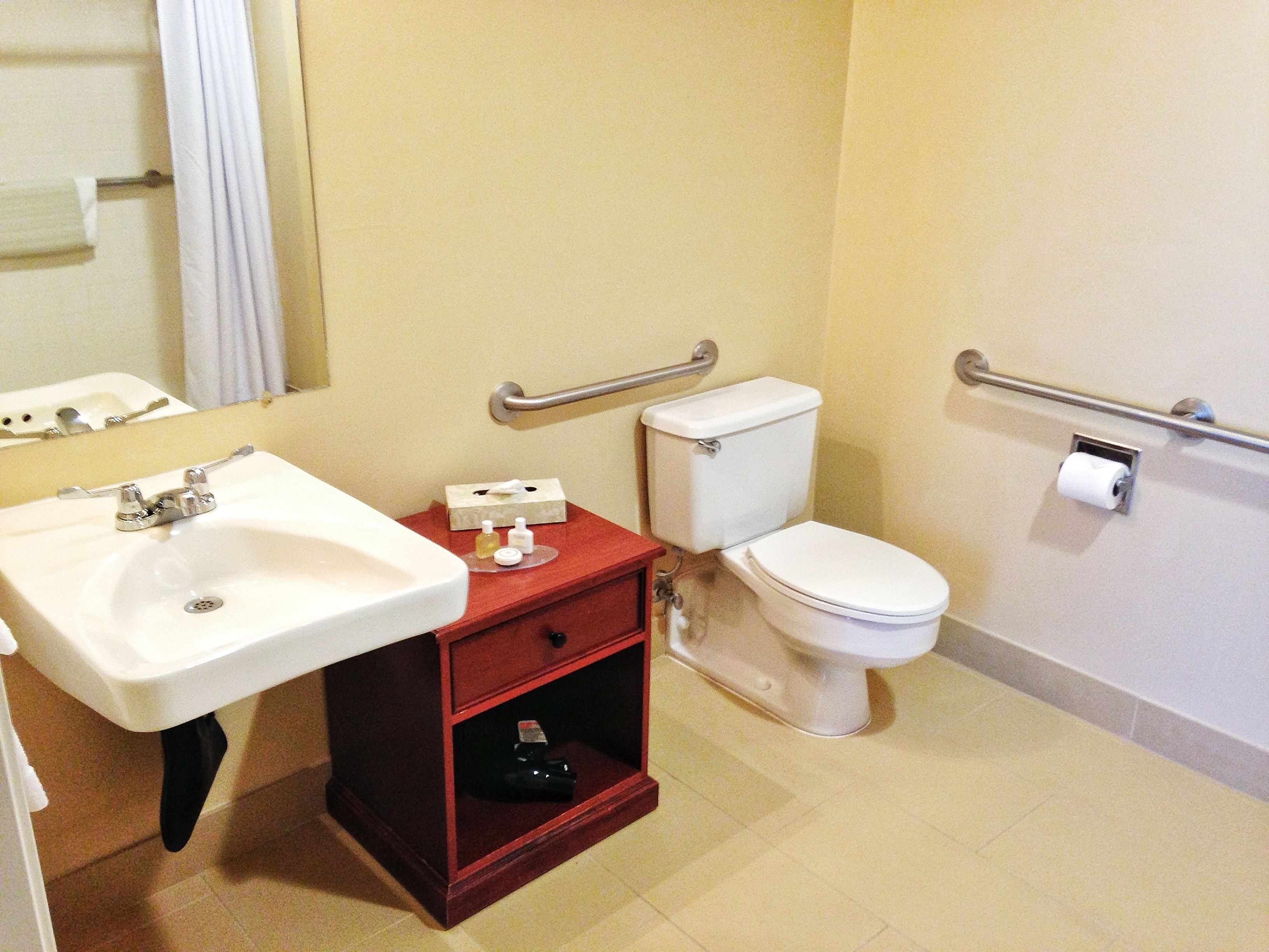 combined shower/bathtub, designer toiletries, hair dryer, towels