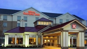A Hilton Garden Inn hotel with a prominent entrance, a covered parking area, and a well-lit facade. - Hilton Garden Inn Pascagoula (Pascagoula)