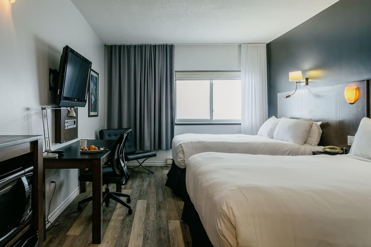 Comfort Room, 2 Double Beds, City View | Premium bedding, desk, soundproofing, iron/ironing board