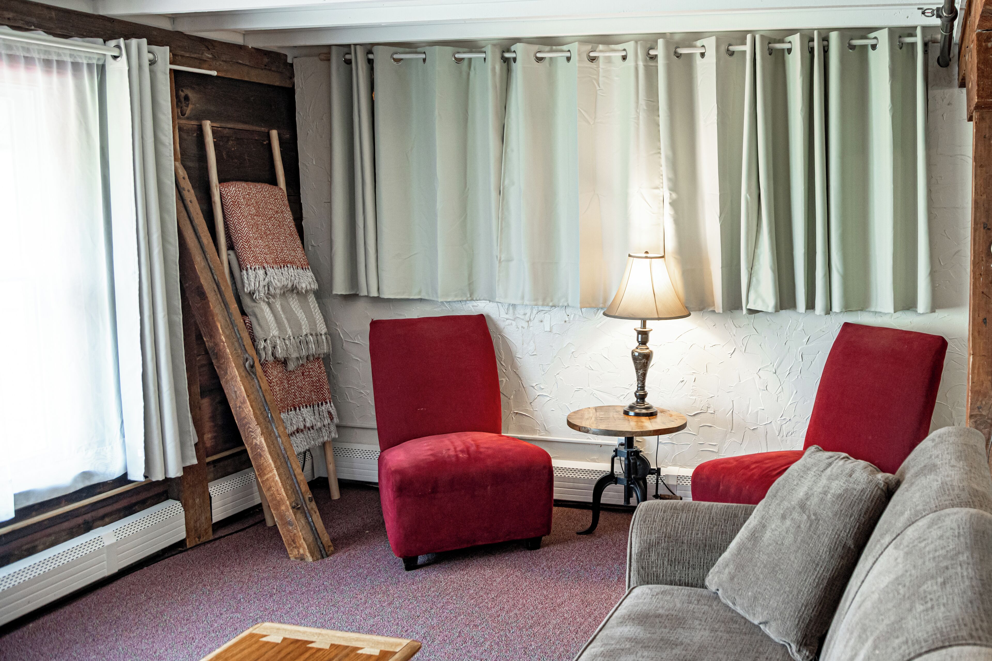 two bedroom barn suite | living area | books