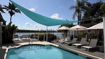 Outdoor pool, free cabanas, pool umbrellas