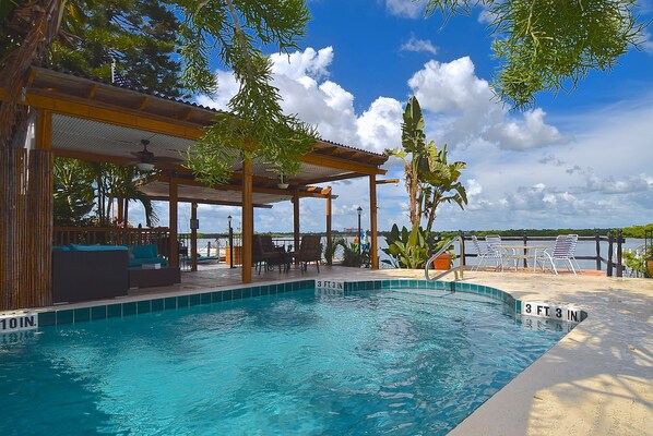 Outdoor pool, free cabanas, pool umbrellas