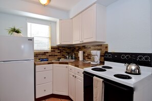 Cottage, Hot Tub, Bay View (Montego Bay Room) | Private kitchen | Fridge, microwave, stovetop, coffee/tea maker
