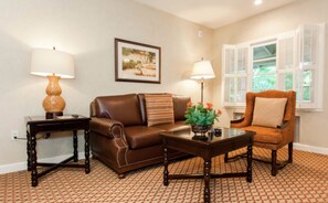 Junior Suite, 1 King Bed with Sofa bed, Fireplace | Living area | 47-inch flat-screen TV with cable channels, TV, DVD player