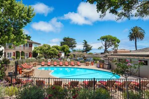 Outdoor pool, a heated pool, sun loungers