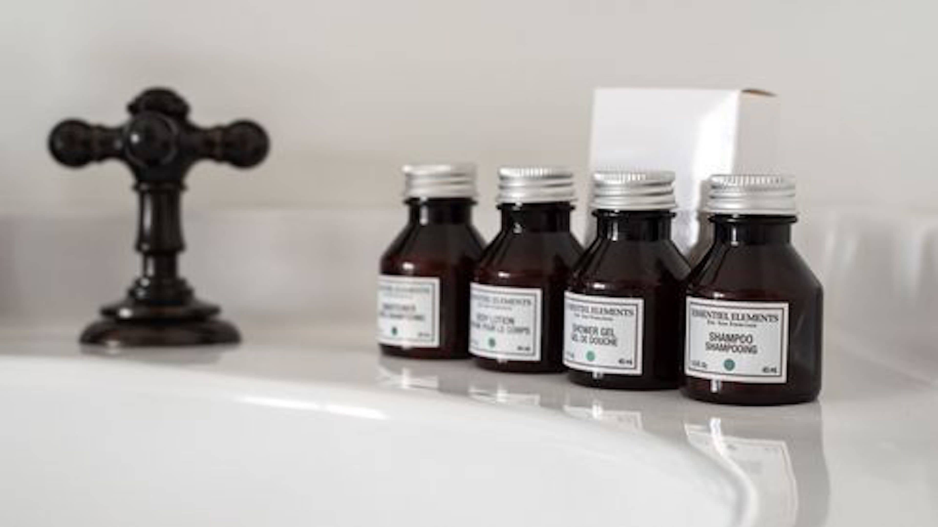 classic room - 1 queen bed | bathroom | hair dryer, towels