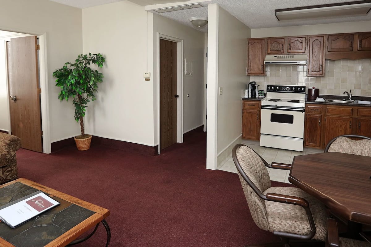 standard suite, 1 queen bed, kitchen | 1 bedroom, premium bedding, iron/ironing board, free wifi