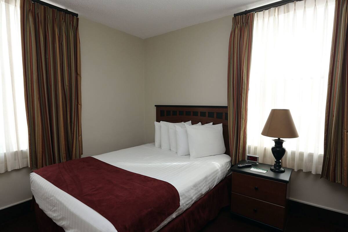 standard suite, 1 queen bed, kitchen | 1 bedroom, premium bedding, iron/ironing board, free wifi