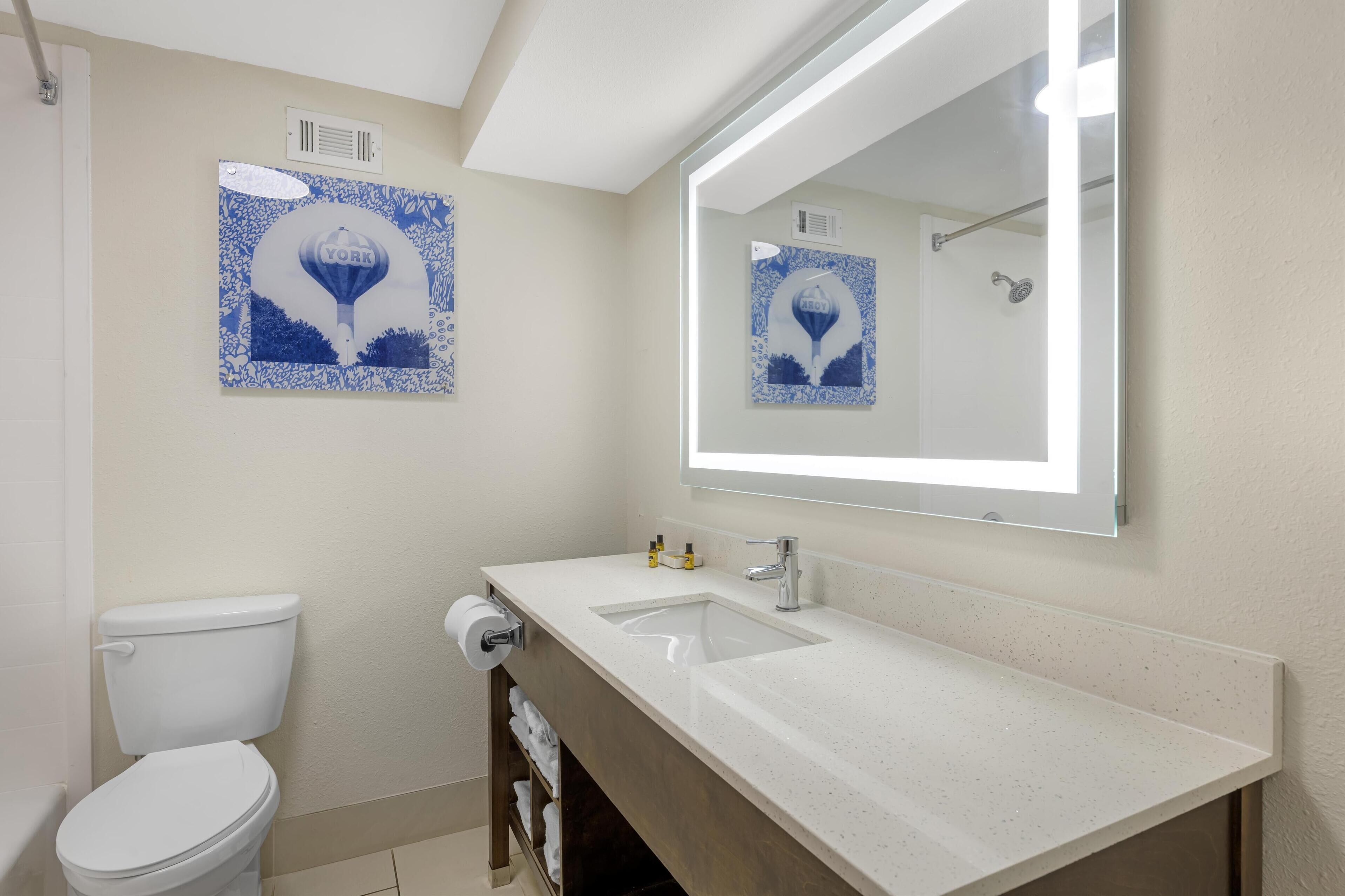 combined shower/bathtub, free toiletries, hair dryer, bathrobes