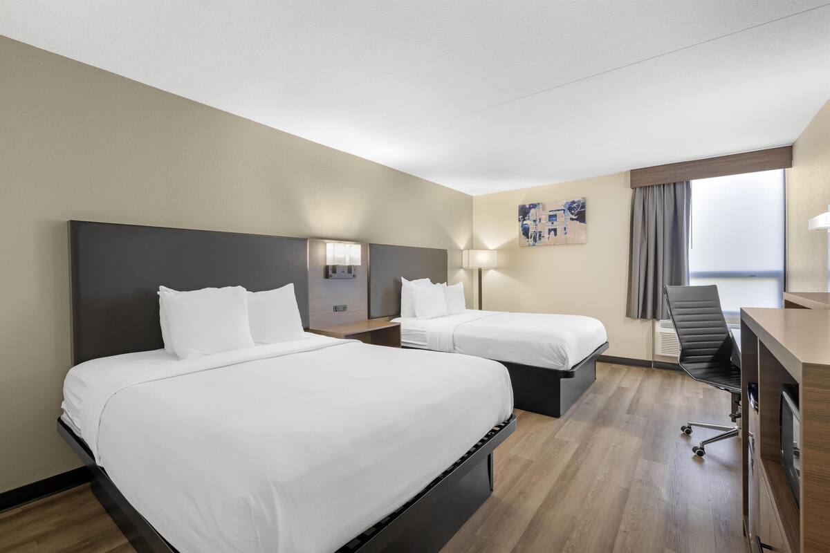 standard room, 2 queen beds, non smoking, refrigerator & microwave (pet friendly) | in-room safe, desk, laptop workspace, blackout curtains