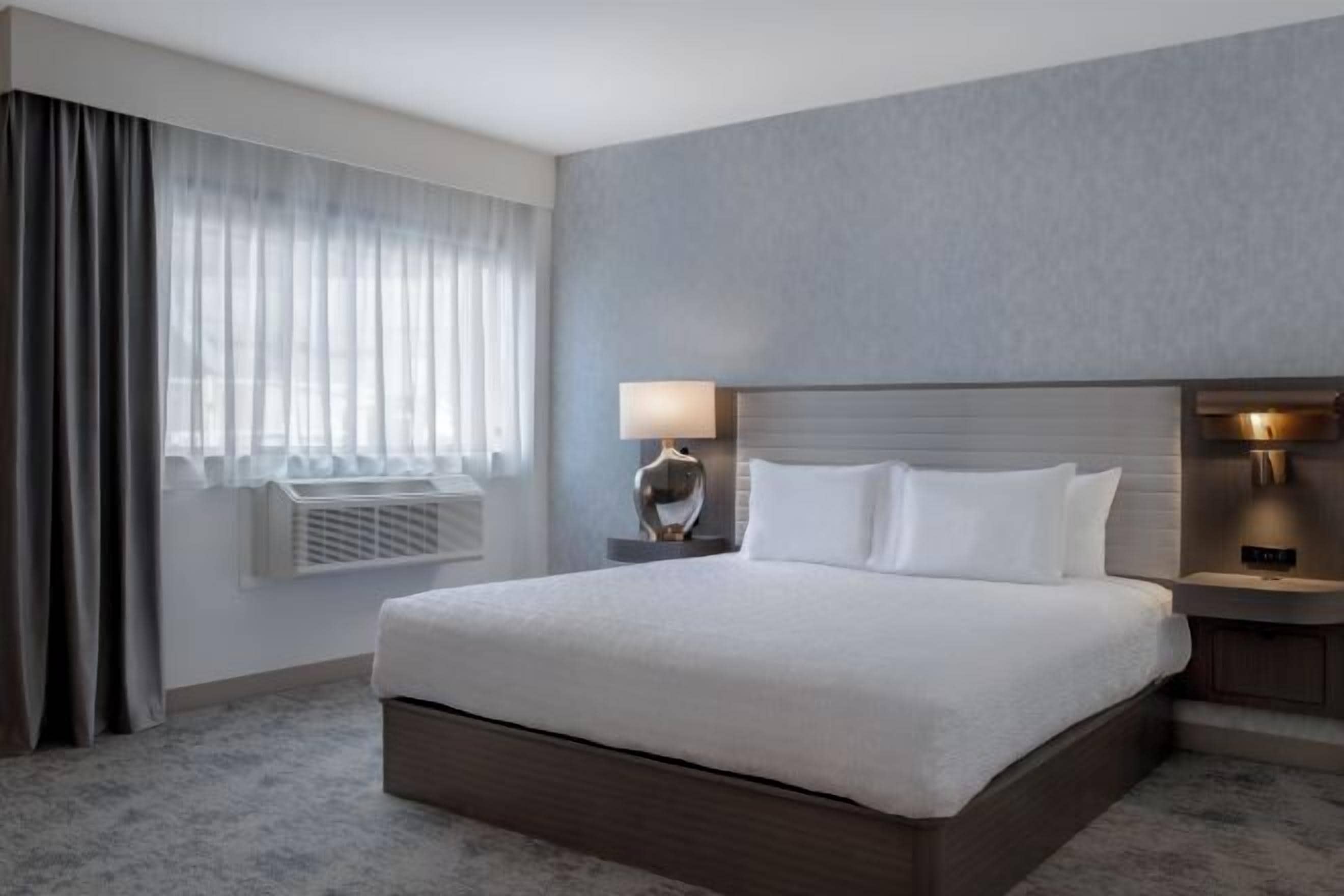 Hypo-allergenic bedding, in-room safe, blackout drapes