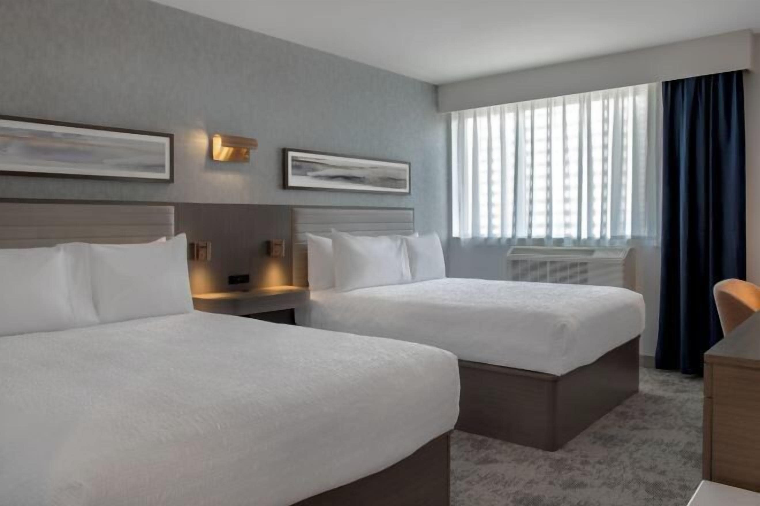 Hypo-allergenic bedding, in-room safe, blackout drapes