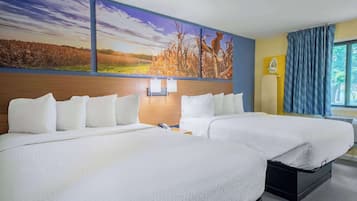 Desk, laptop workspace, iron/ironing board, free cribs/infant beds