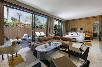 Frette Italian sheets, premium bedding, down comforters, minibar at LHorizon Resort & Spa, Hermann Bungalows