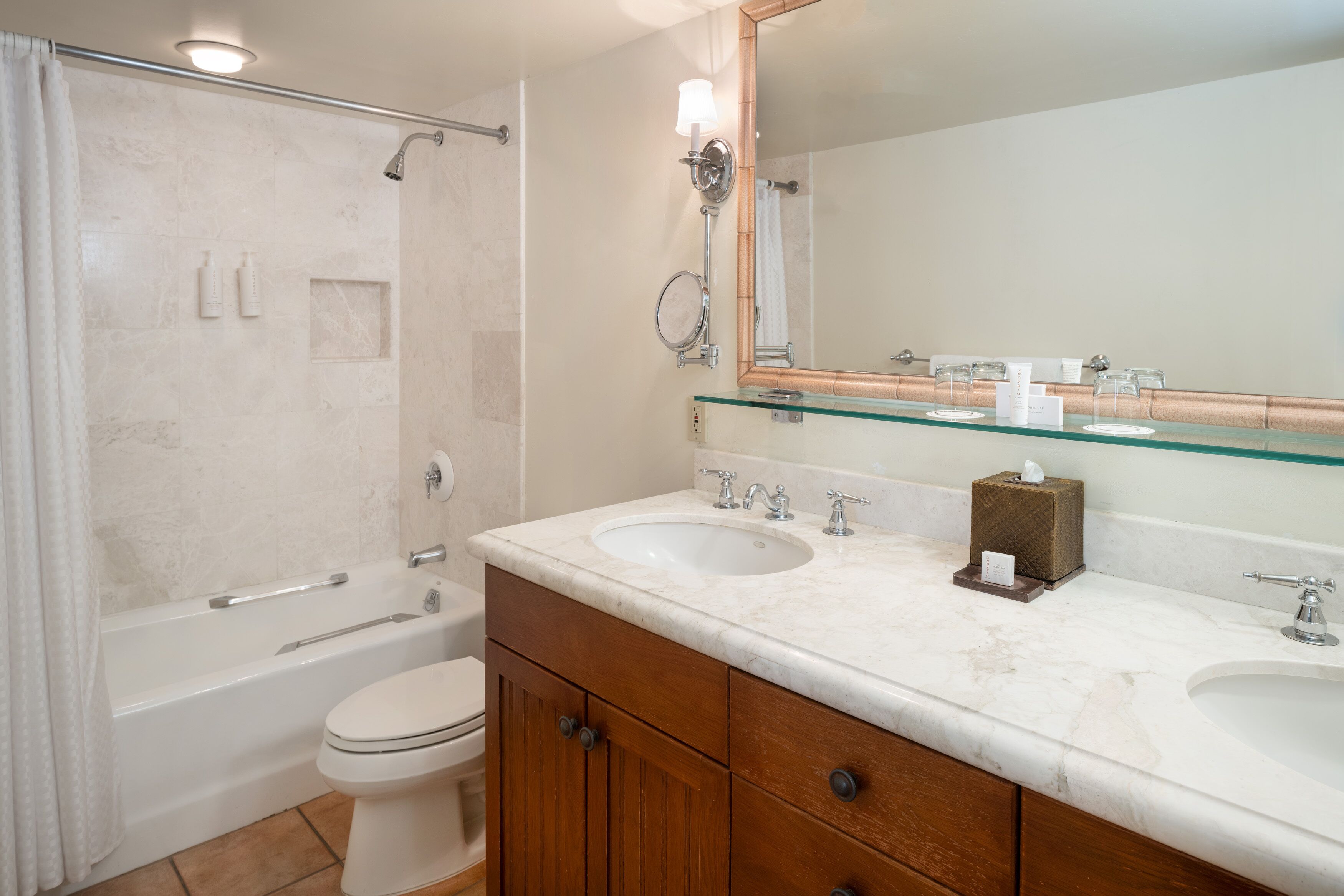 combined shower/bathtub, designer toiletries, hair dryer, bathrobes