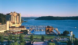 A resort with a large building, a marina with boats, and a water park. - The Coeur D'alene Golf and Spa Resort (Coeur d'Alene)