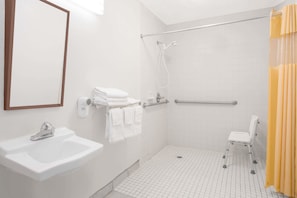 Combined shower/tub, deep soaking tub, free toiletries, hair dryer