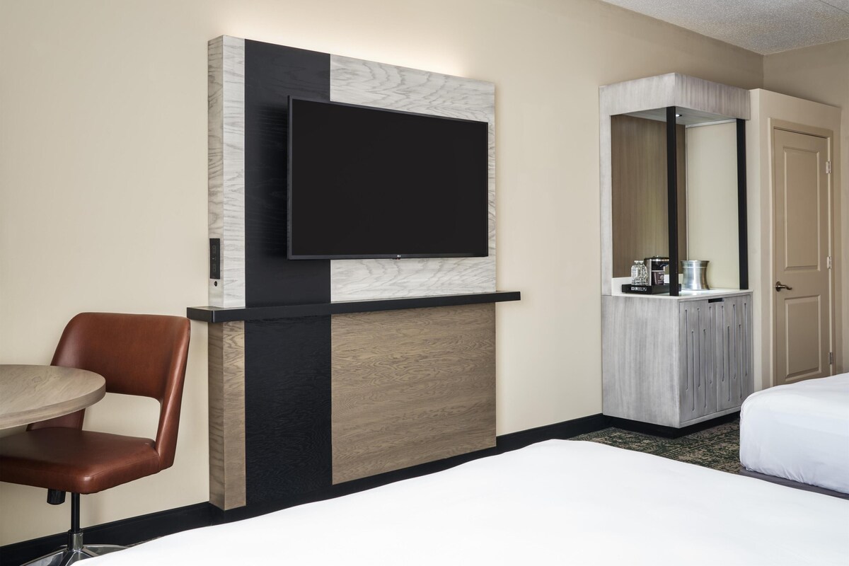 Luxe beddengoed, een kluis op de kamer, een bureau