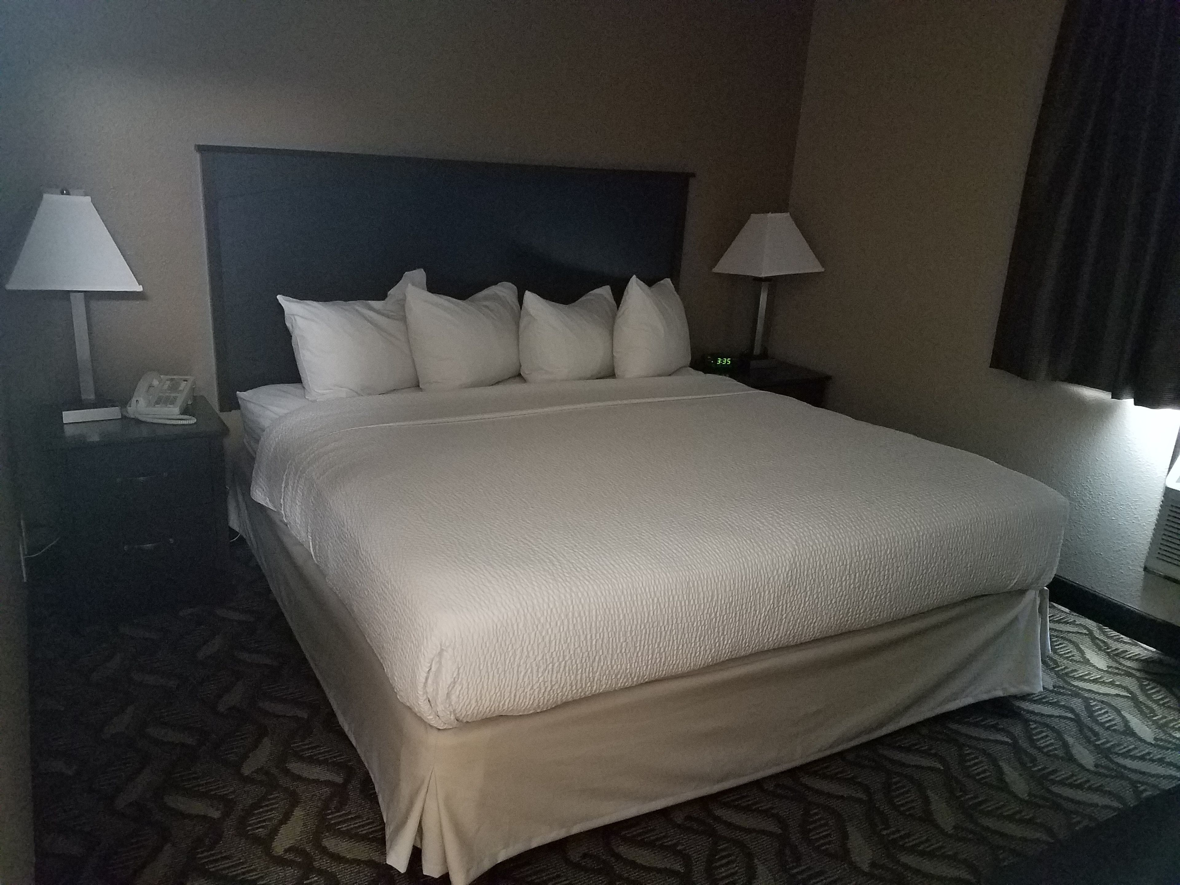 suite, one king bed, non-smoking | in-room safe, desk, blackout curtains, iron/ironing board