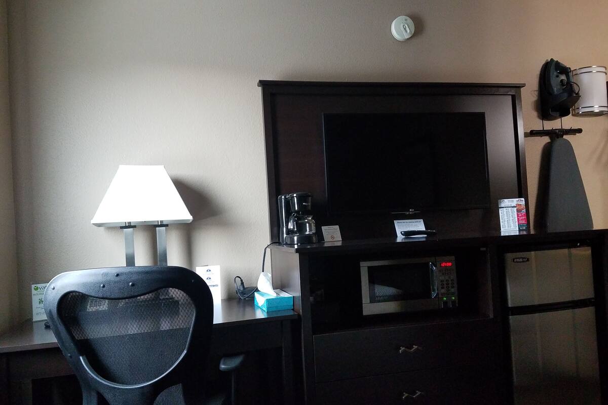 in-room safe, desk, blackout curtains, iron/ironing board