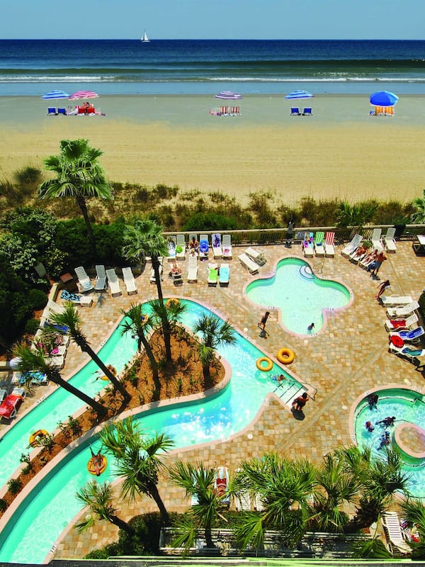 Indoor pool, seasonal outdoor pool, pool umbrellas, sun loungers