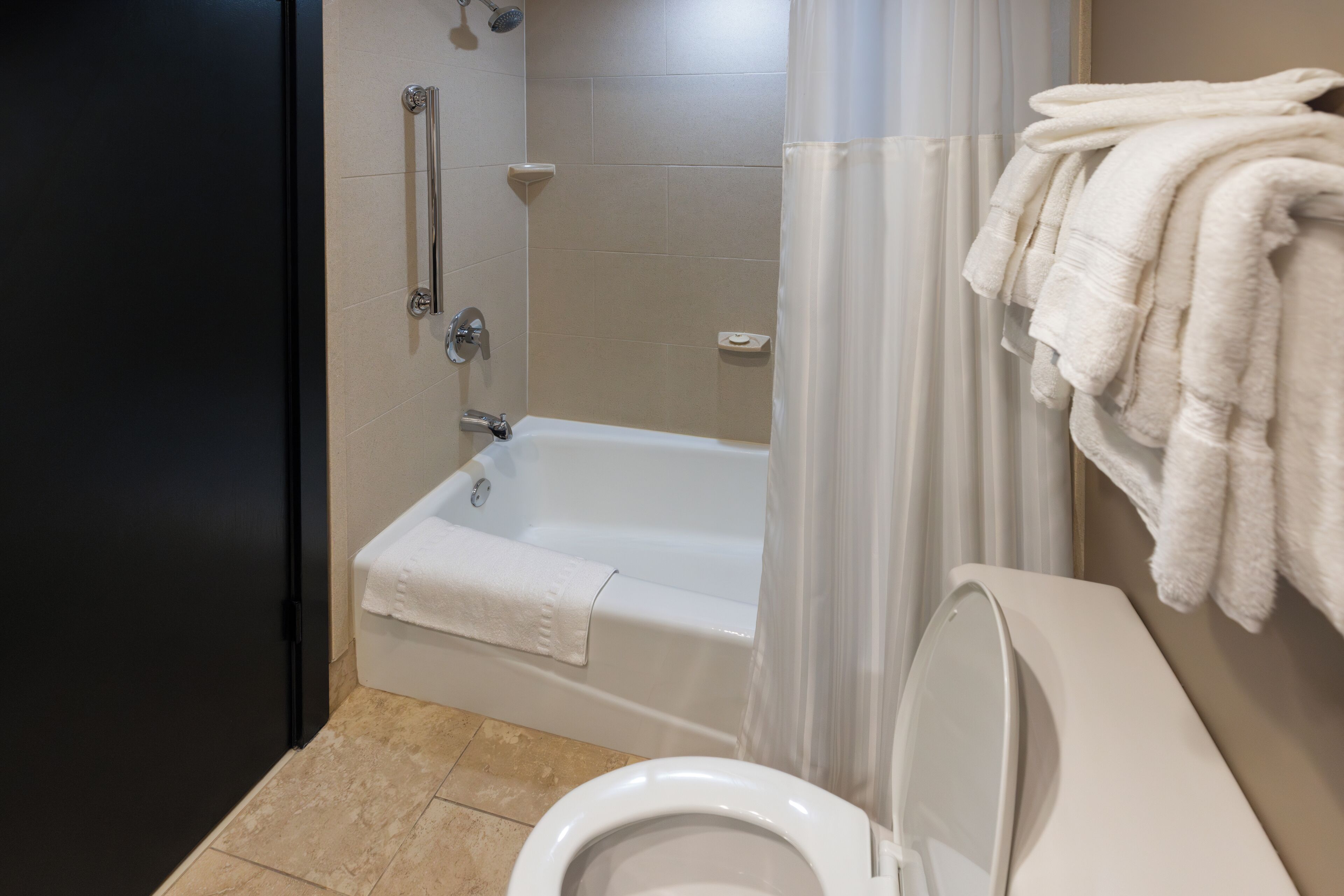 standard suite, 1 king bed with sofa bed, city view | bathroom | designer toiletries, hair dryer, towels, soap