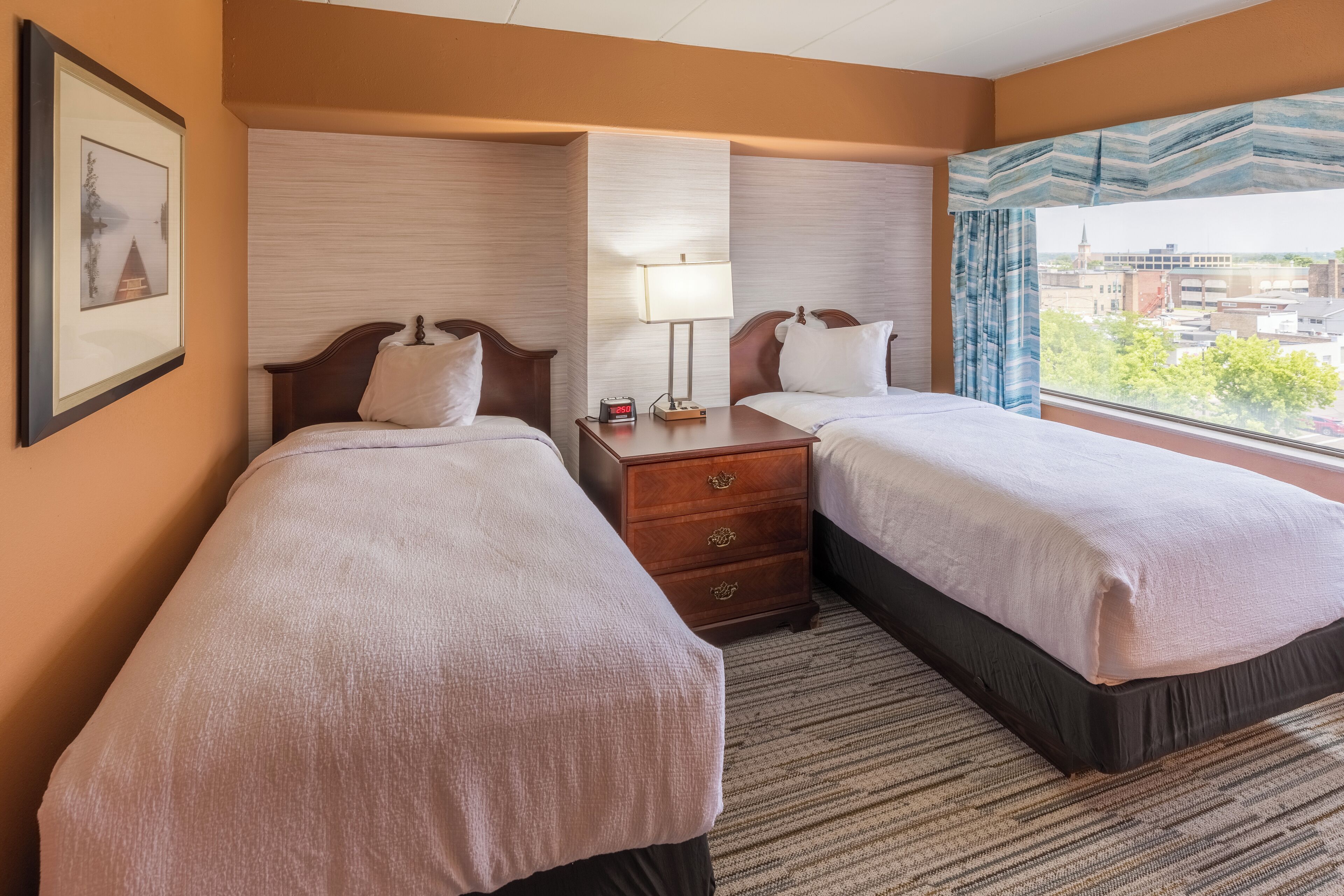 standard suite, 2 bedrooms, city view, corner (1 king, 2 twin and 1 sofabed) | in-room safe, blackout curtains, iron/ironing board, free wifi