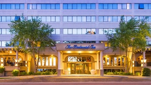 A hotel with a classic facade, large windows, and a prominent entrance. - The Boulevard Inn & Bistro (Saint Joseph)