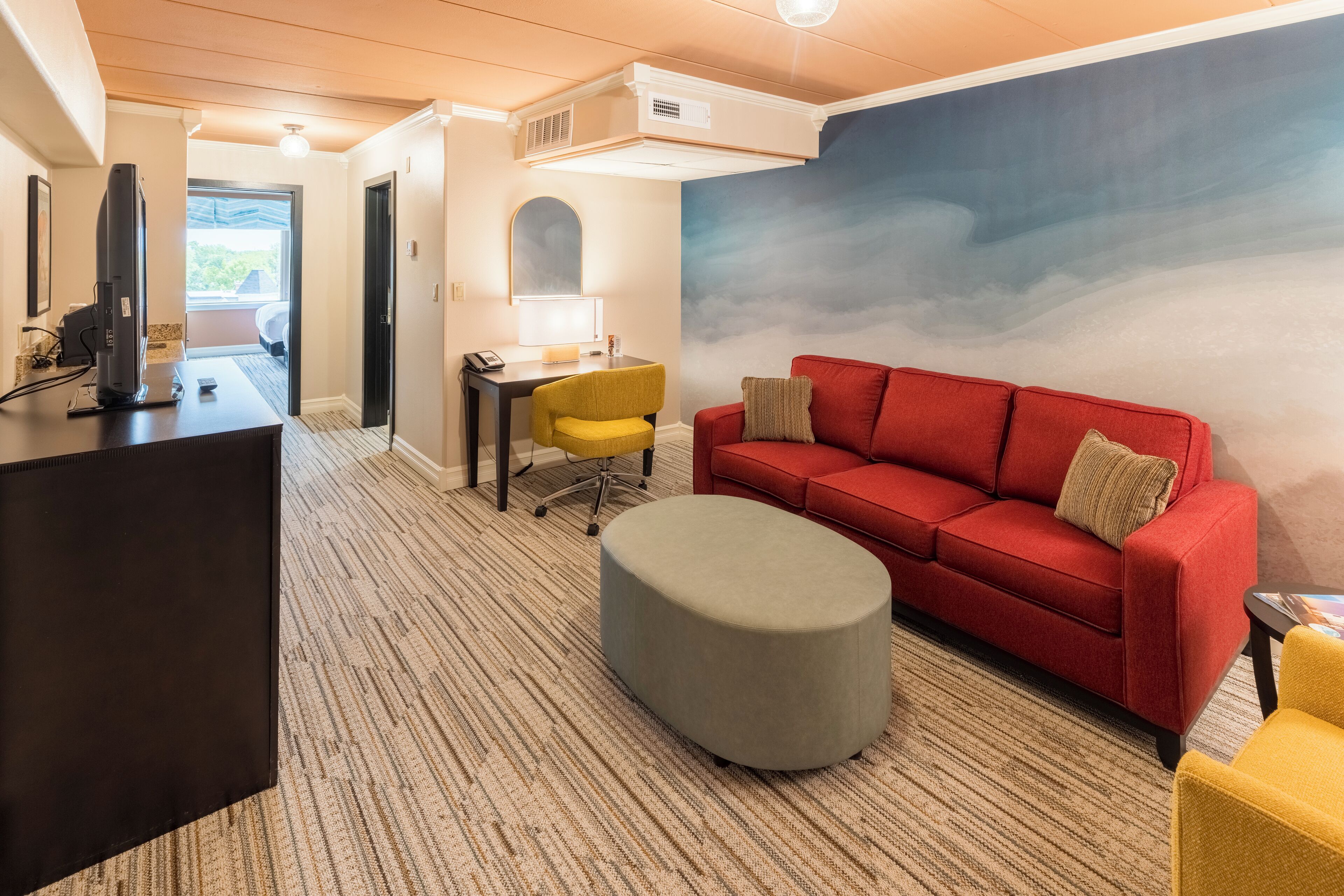 standard suite, city view (2 double beds and 1 sofa bed) | living area | 42-inch flat-screen tv with cable channels, tv, netflix