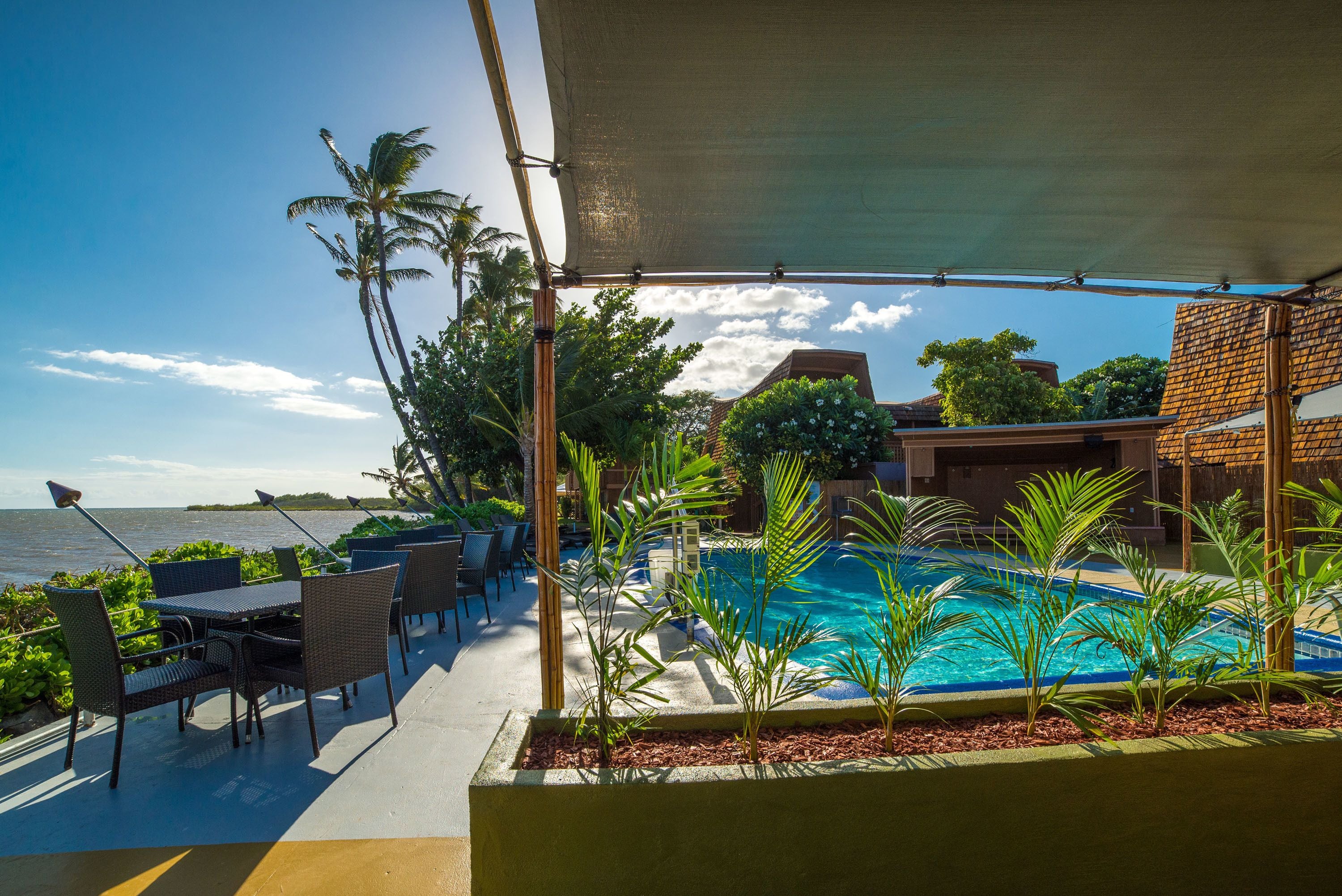 outdoor pool, open 9:00 am to 9:00 pm, pool umbrellas, pool loungers