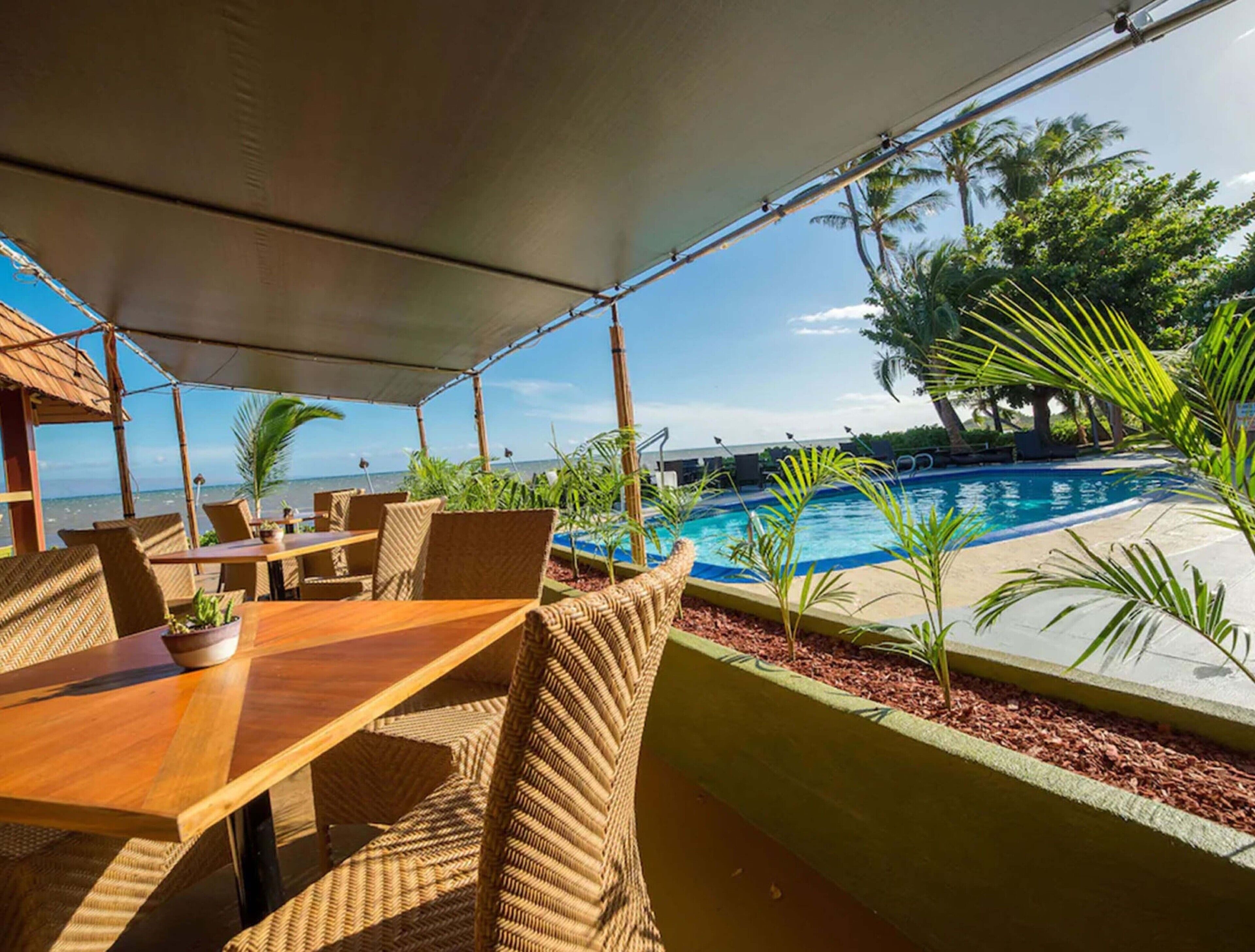 outdoor pool, open 9:00 am to 9:00 pm, pool umbrellas, pool loungers