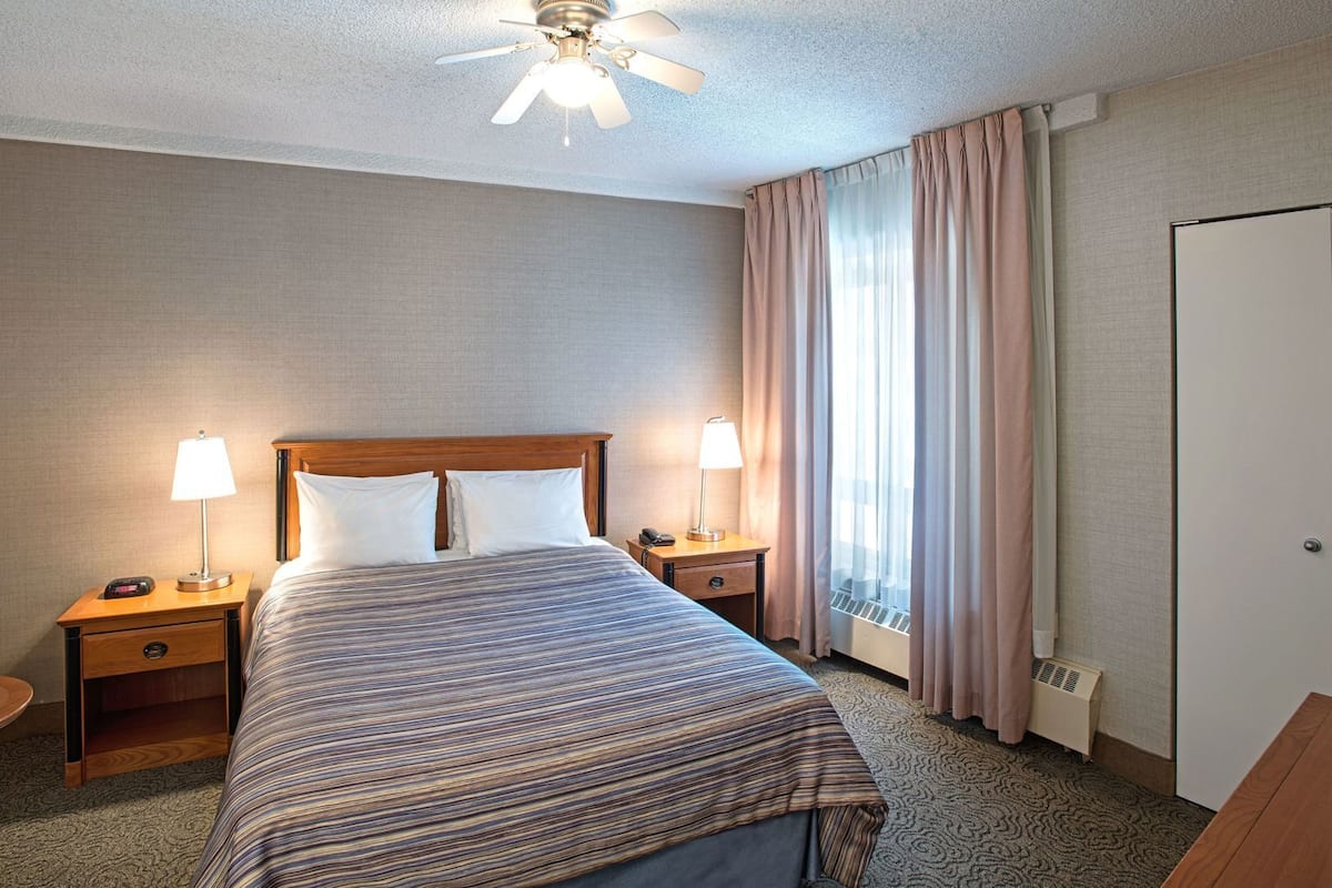 Premium bedding, pillowtop beds, desk, blackout drapes