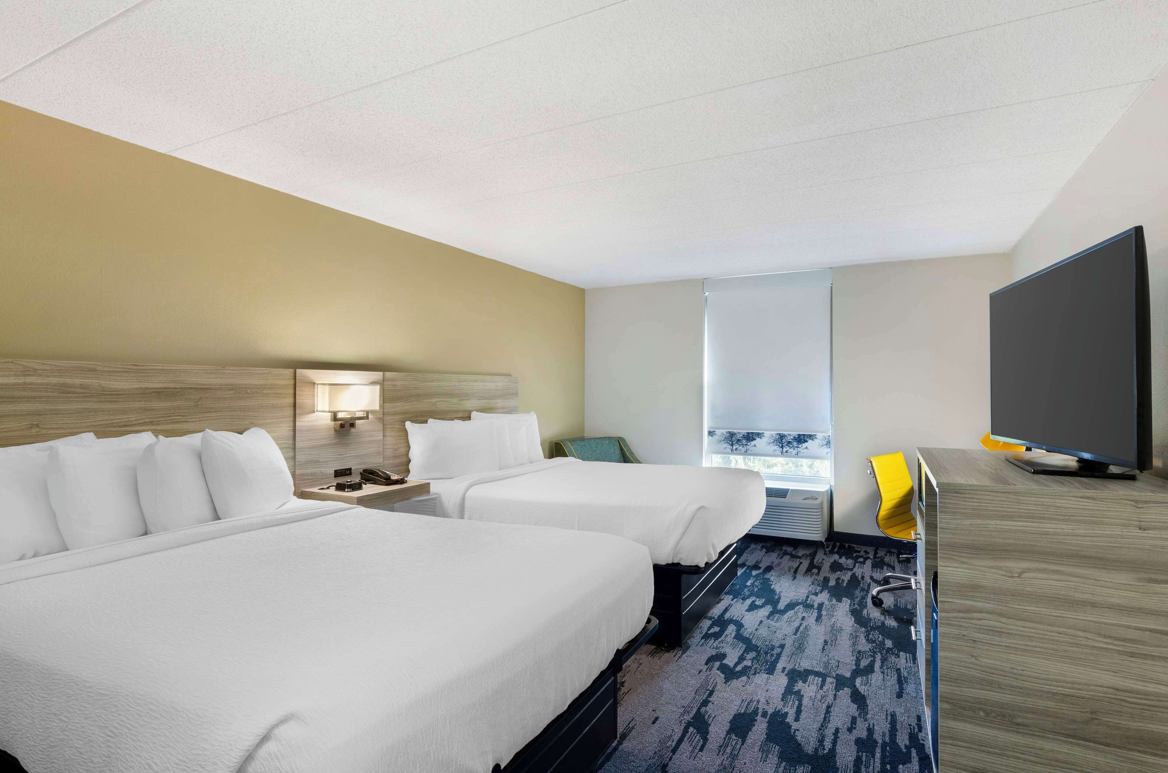 standard room, 2 queen beds, non smoking, refrigerator & microwave | 1 bedroom, in-room safe, desk, blackout curtains